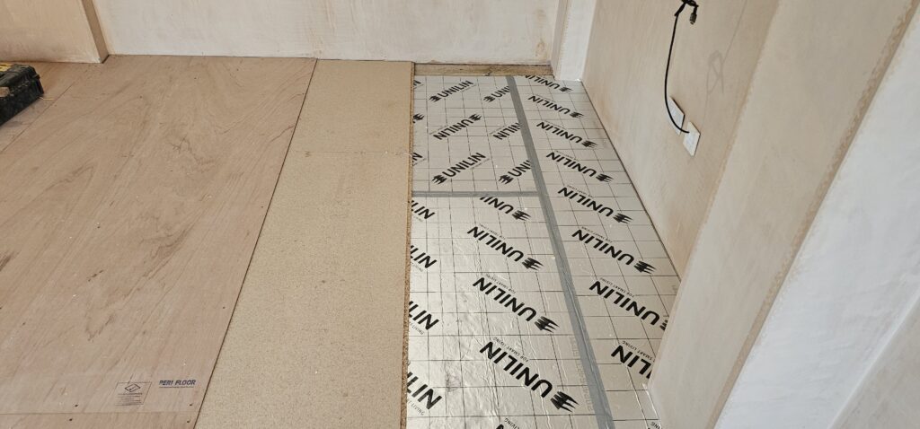 Insulated floor going down in a garage conversion