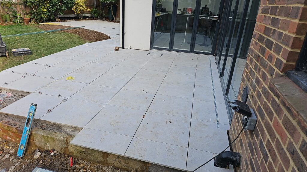 Finished porcelain patio and landscaping