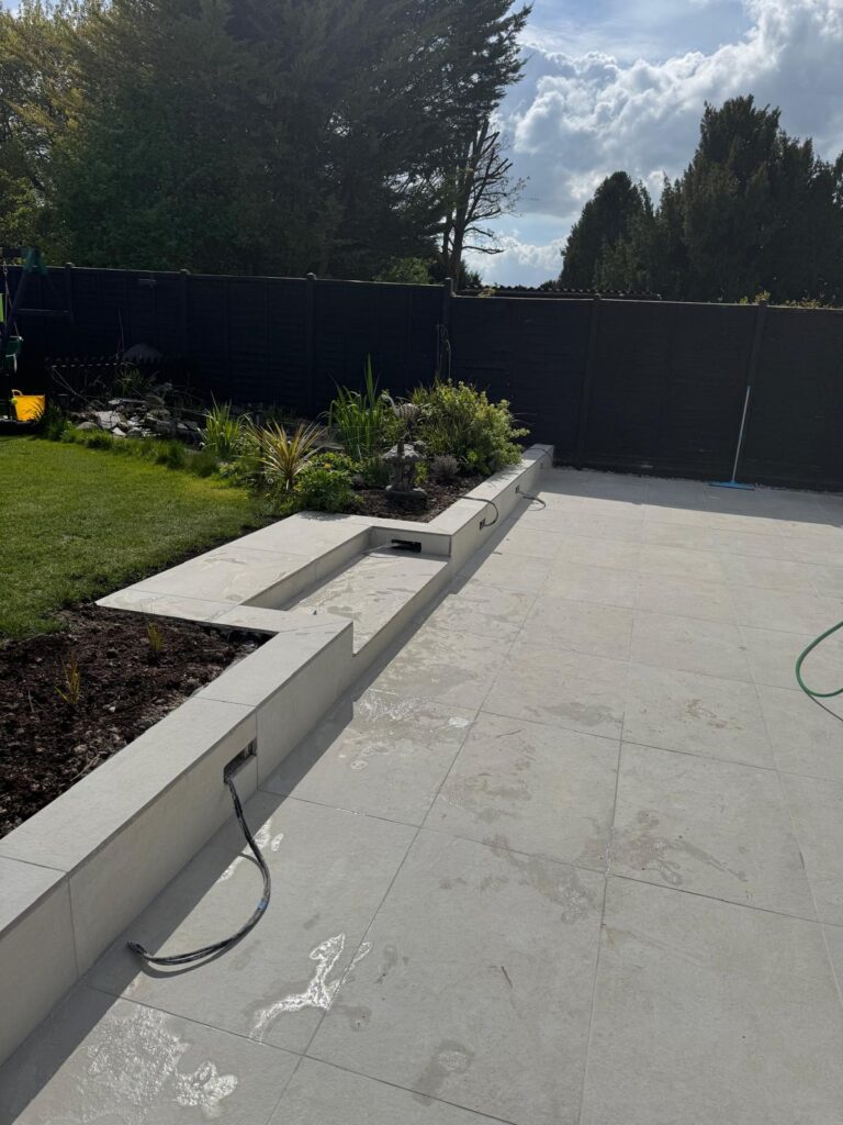 New porcelain patio with a raised border