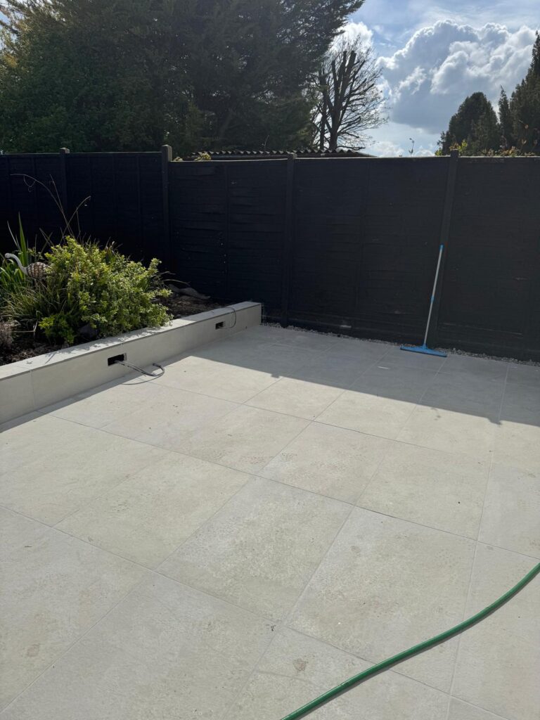 New porcelain patio with a raised border