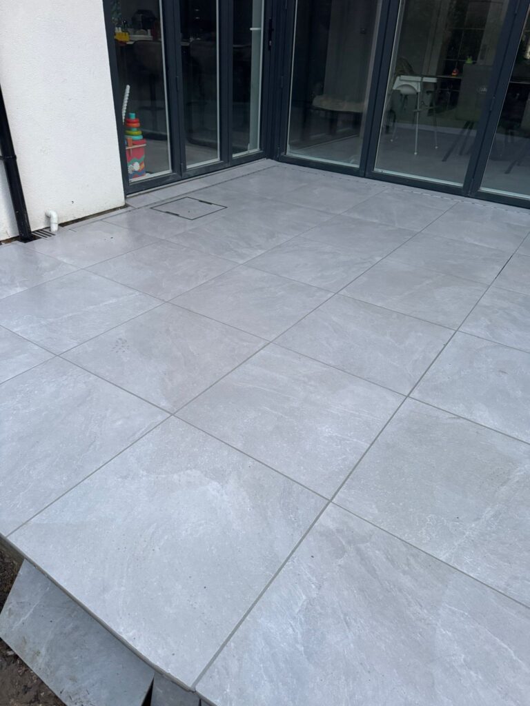 Finished porcelain patio and landscaping